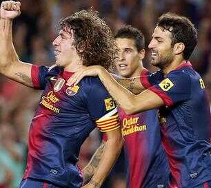 صور : لاعبو برشلونة يهنئون بويول بعيد ميلاده