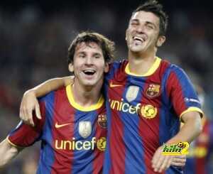 Barcelona's Villa celebrates his goal against Panathinaikos with teammate Messi during their Champions League Group D soccer match at Nou Camp stadium in Barcelona