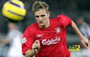 Igor Biscan of Liverpool looks at the ba