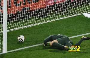 England's goalkeeper Robert Green misses