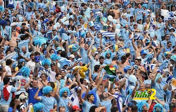 1403625470527_lc_galleryImage_Uruguayan_fans_cheer_prio