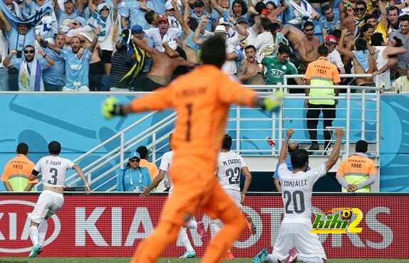 1403632802462_lc_galleryImage_Uruguay_s_Diego_Godin_lef
