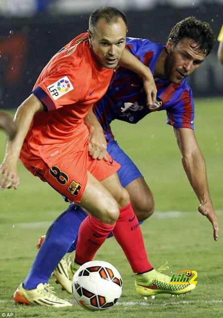 1411327609489_lc_galleryImage_Barcelona_s_Iniesta_left_