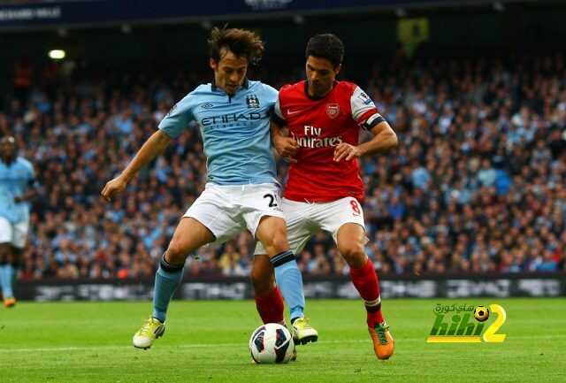 David Silva of Manchester City and Mikel Arteta of Arsenal