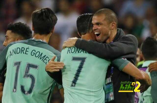 Football Soccer - Portugal v Wales - EURO 2016 - Semi Final - Stade de Lyon, Lyon, France - 6/7/16 Portugal's Cristiano Ronaldo and Pepe hug as they celebrate after the game REUTERS/Robert Pratta Livepic
