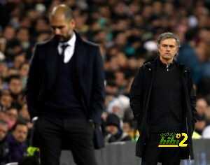 10 Dec 2011, Madrid, Spain --- Real Madrid's coach Jose Mourinho (R) looks at Barcelona coach Pep Guardiola after Xavi Hernandez goal during their Spanish first division soccer match, the Clasico, at the Santiago Bernabeu stadium in Madrid, December 10, 2011. REUTERS/Sergio Perez (SPAIN - Tags: SPORT SOCCER) --- Image by © SERGIO PEREZ/Reuters/Corbis